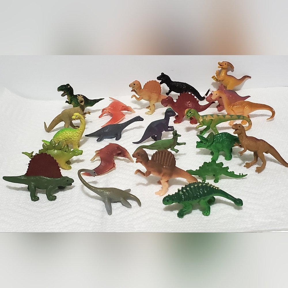 23 - Assorted Small Dinosaur figures.